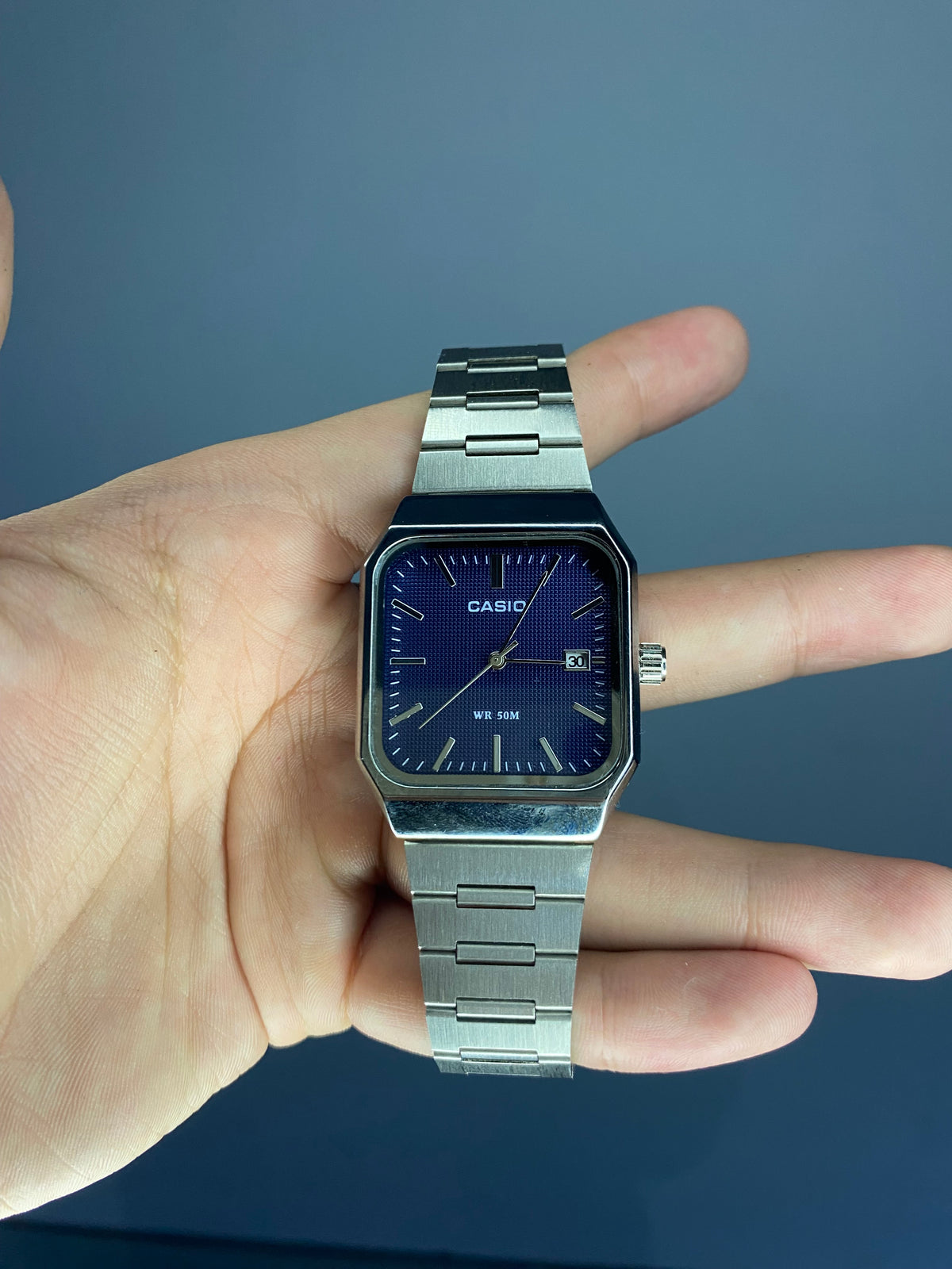 Casio 12 Plata Azul (premium)
